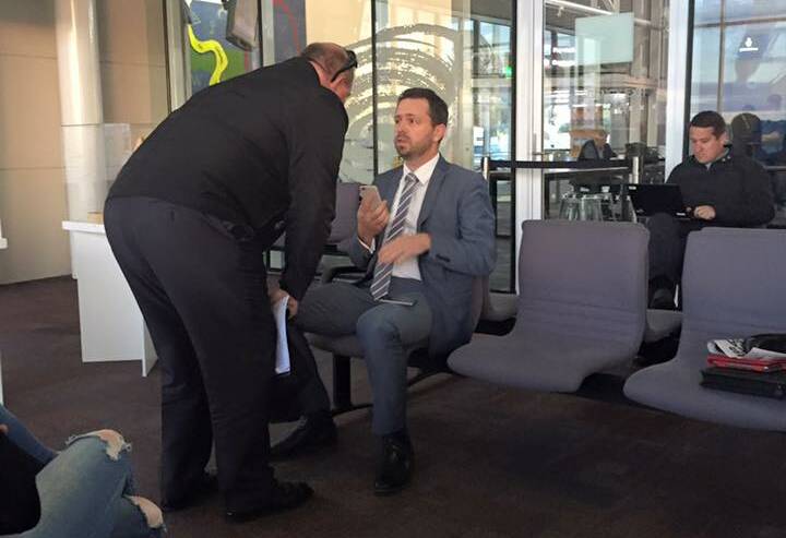 Council general manager Alan Eldridge allegedly berates retired councilor Julian McLaren while awaiting a flight to Sydney at around 6am on Tuesday.