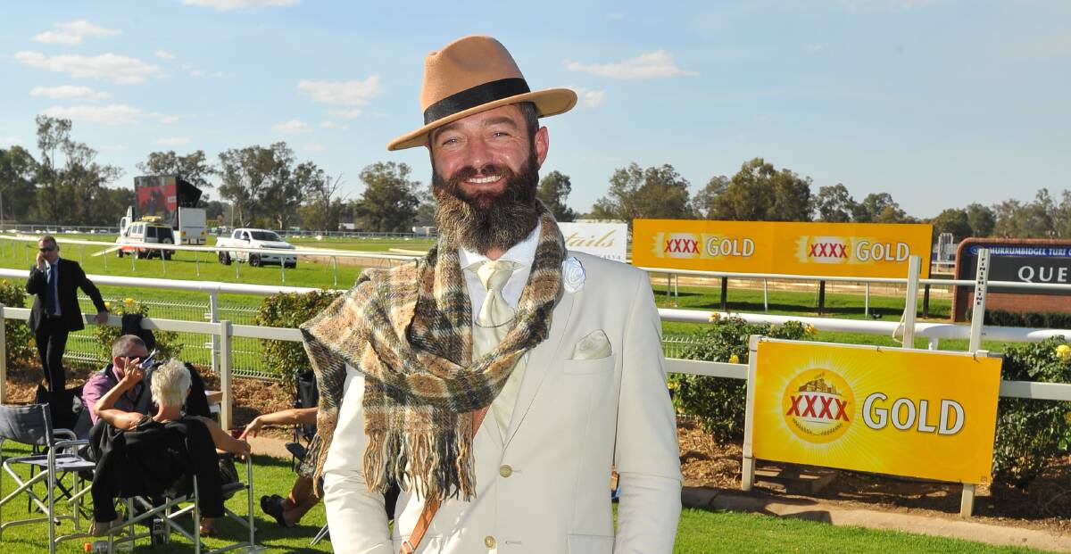 DAPPER GENTLEMAN: Winner of Fashions on the Field Man of the Day Nathan Button, wearing shades of beige and brown for autumn. All photos: Kieren L. Tilly.
