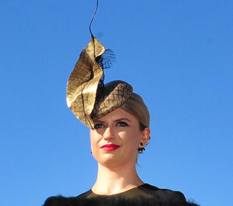 TOP HAT: 2015 Fashion on the Field millinery winner Ally Mullins showcasing a unique headpiece.