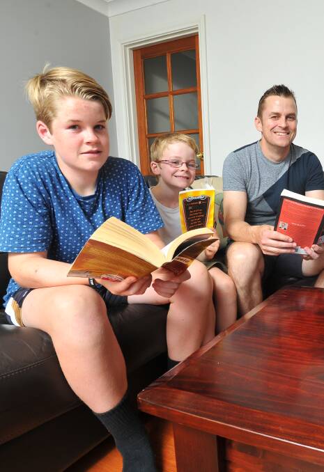 DIGITAL DETOX: Wagga father Daniel Burns, with two of his four sons, Callum and Billie, decided to put limitations on his kids' use of technology.