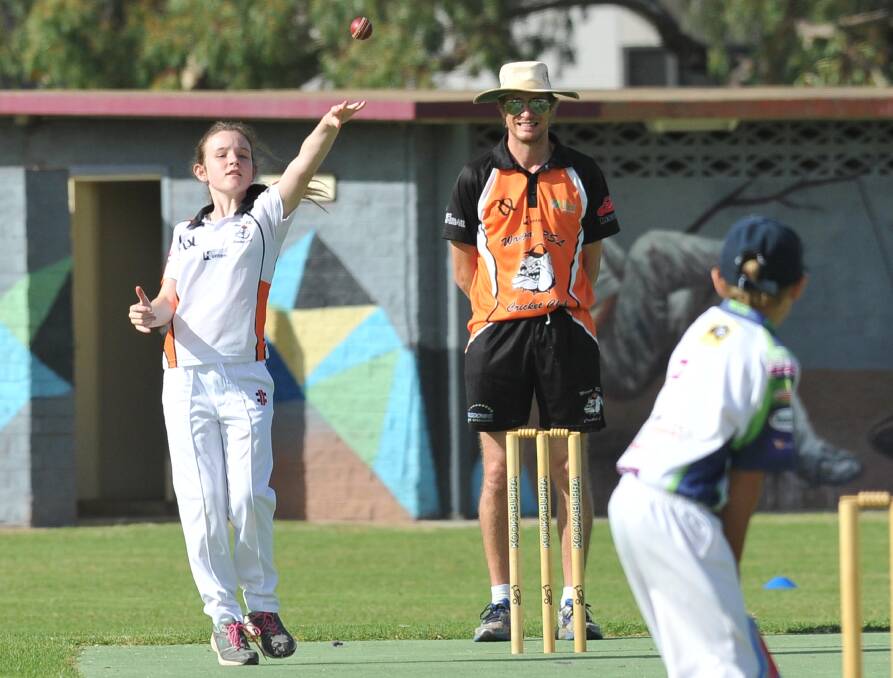 HIGH-ACHIEVER: Emily Greens sends a ball down the pitch during a junior cricket clash at Bolton Park. Picture: Laura Hardwick