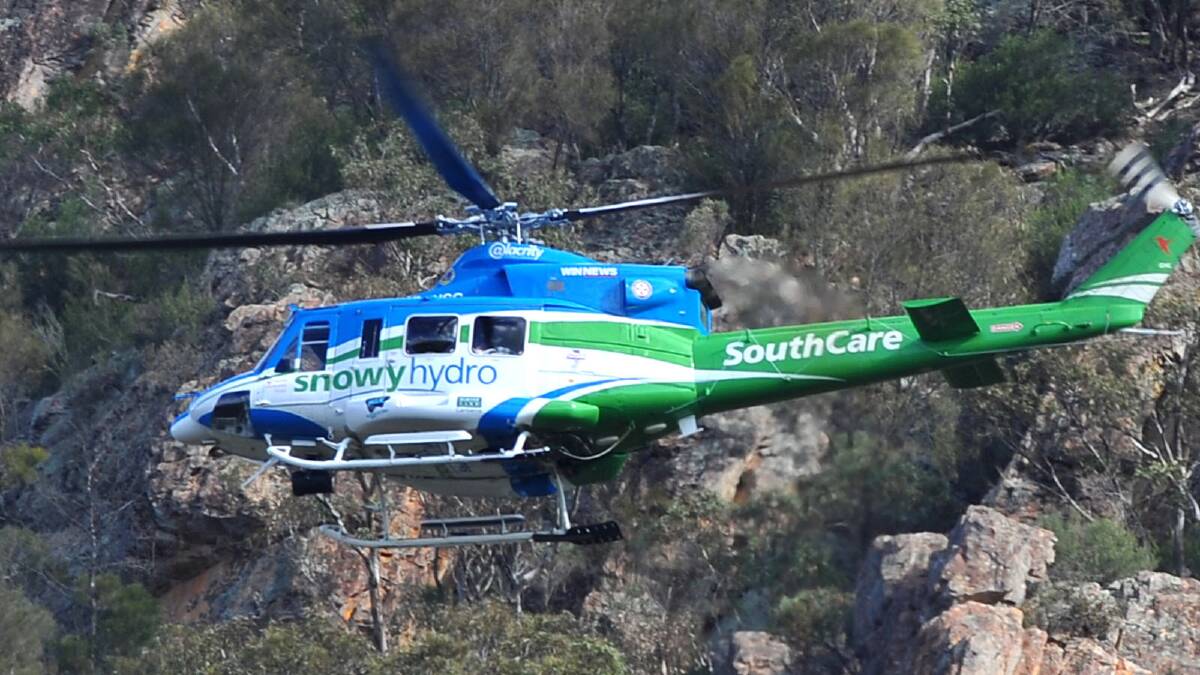 Woman trapped in car near Henty