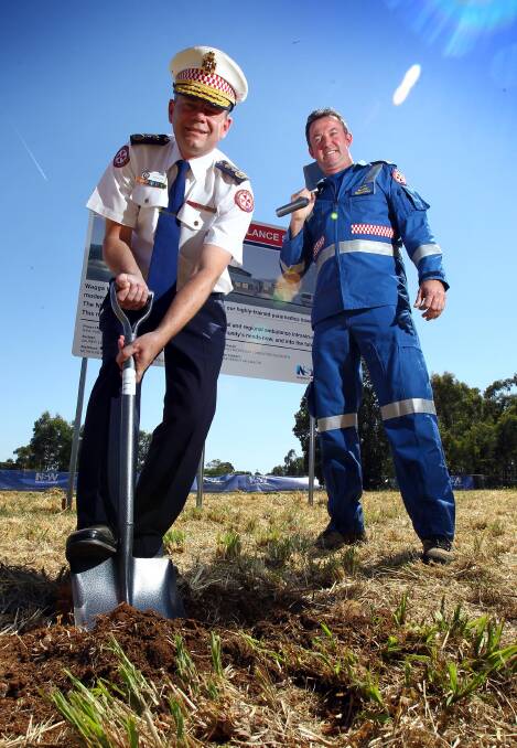 NSW Ambulance Service commissioner David Dutton and paramedic Troy Baggett at the site of the new ambulance station on Fernleigh Road. Picture: Les Smith