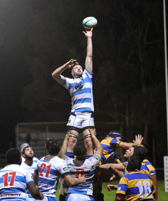 FINGERTIP CONTROL: Wagga City's James Maloney tries to bring a ball down from a line up in the Boiled Lollies' loss to Albury. The lineout was one of the team's biggest weaknesses on Friday night. Picture: Laura Hardwick
