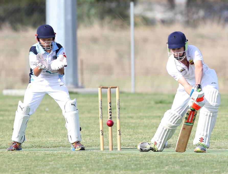 BLOCKED BALL: Angus McLay defends a ball on Saturday as South Wagga wicketkeeper Cooper Diessel looks to gather the loose ball.