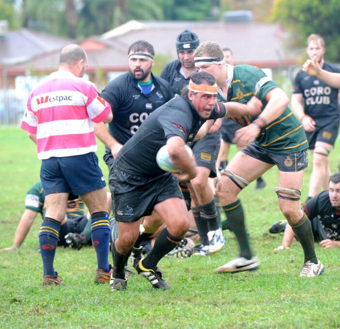ON THE CHARGE: Augustin de Notta steams forward for Griffith as the Blacks come away with a 15-point win over Ag College at Coro Club Oval on Saturday. Picture: The Area News