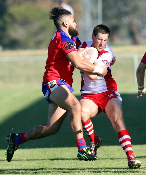 GOT HIM: Kangaroos centre Eddie Lagaali looks to take down Temora fullback Taylor Krause in his team's nail biting win on Saturday. Picture: Les Smith