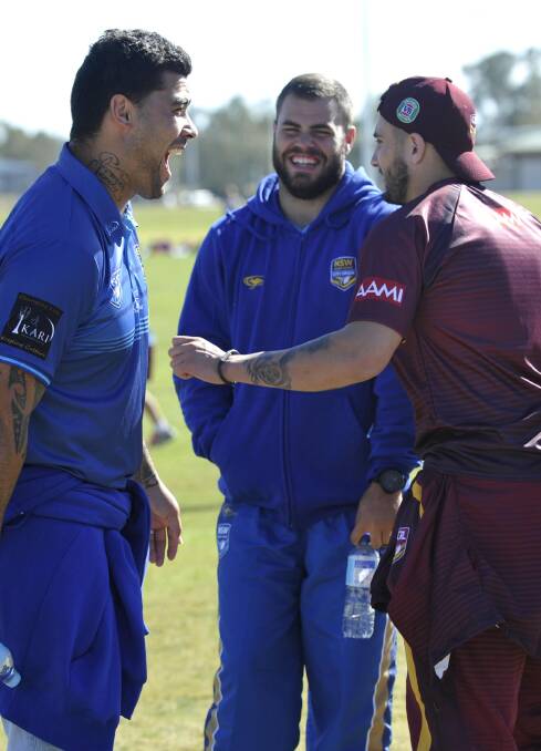 Fifita, Graham and Bird share a joke as the two teams come together in Wagga.