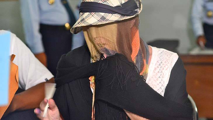 Out of jail: Schapelle Corby covered her face when she was released. Photo: Justin McManus 