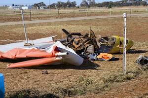 WRITE-OFF: Two West Wyalong men were lucky to escape the wreckage of this light plane, which crashed in a paddock to the town's south yesterday morning. Pictures: West Wyalong Advocate