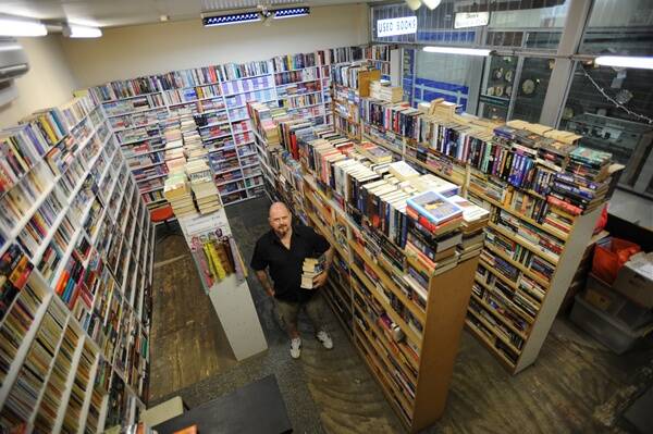 RE-WRITING HISTORY: Owner of BT Used Books in the South Town Walk arcade on Baylis Street, Tony Curtis, says the word “nigger” should not be removed from classic Mark Twain novels as it is meddling with historical writing. picture: Addison Hamilton