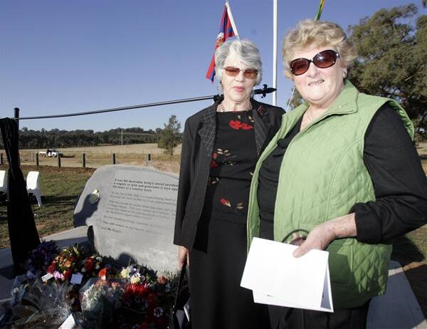 REMEMBRANCE: Maureen Raunic, of Ballarat and Neryl Hogan, of Canberra, were both 10 months olds when their fathers Herbert John Pomeroy and Jack Clinton Nixon were killed during a training exercise at Kapooka. Yesterday, both had the chance to remember their fathers in the dedication of a permanent Kapooka Tragedy Memorial. Picture: Oscar Colman