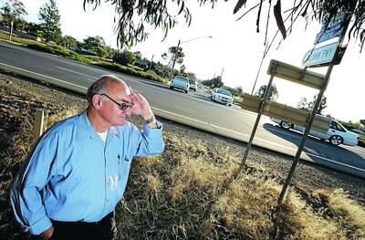 COMING SOON: Glenfield resident Graham Jackaman surveys the Glenfield Road and Dalman Parkway intersection where Wagga City Council is planning to build a $2.85 million roundabout. Picture: Les Smith