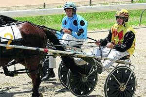 CHALLENGERS: Junee Reefs trainer-driver Matthew Harris (left), pictured with Mal Diebert, will be up against it today when he drives Wry Tangles against Victorian star three-year-old Sushi Sushi. Harris is not excited by the prospect of racing Sushi Sushi. Picture: Les Smith