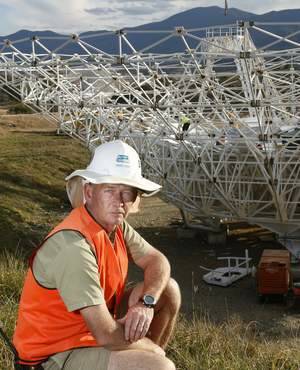 Civil technician David True in front of DSS-35 a new 34 m beam waveguide antenna being constructed at the Canberra Deep Space Communication Complex in Tidbinbilla. Photo: Jeffrey Chan