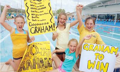 GO TEAM: Great team support was on show at the Lake Albert swimming carnival from Chloe Chapman, Sara Voveris and Lilly Amos, with Grace Fleming in front.