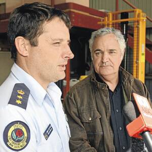 DISASTER ZONE: (left) State Emergency Services regional controller James McTavish addresses the media after acting Emergency Services Minister Phil Costa announced six council areas as natural disaster zones.