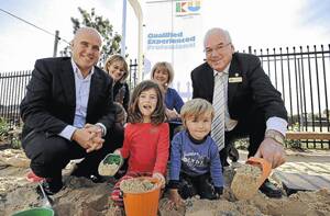 NEW BEGINNINGS: (Back from left) Minister for Education Adrian Piccoli, KU Koala Preschool director Dimity Cowley, KU Children Services CEO Christine Legg and Wagga mayor Kerry Pascoe celebrate the opening of the new KU Koala Preschool in Murray Street while (front from left) Lucy Davies, 4, Ella Saxon, 4, and Clive Riethmuller, 3, play. Picture: Oscar Colman