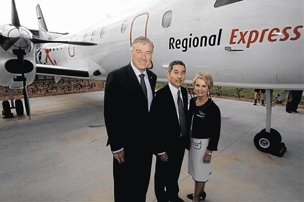 TAKING OFF: (from left) Regional Express deputy chairman John Sharp, Regional Express executive chairman Lim Kim Hai and federal member for Riverina Kay Hull celebrate the official opening of the Wagga aviation and education hub. Picture: Oscar Colman