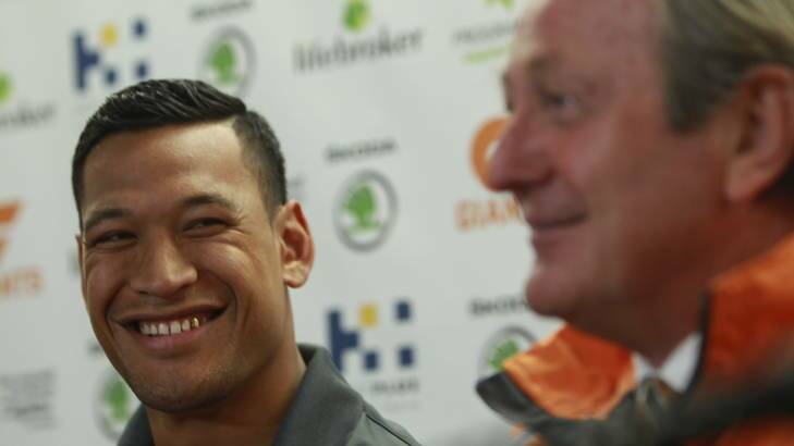 Israel Folau announces his retirement from the AFL at Thursday's press conference with GWS coach Kevin Sheedy.