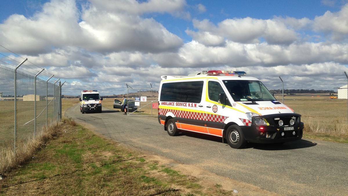 Emergency services at the scene of a light plane crash in Wagga Wagga. Photo: ADDISON HAMILTON