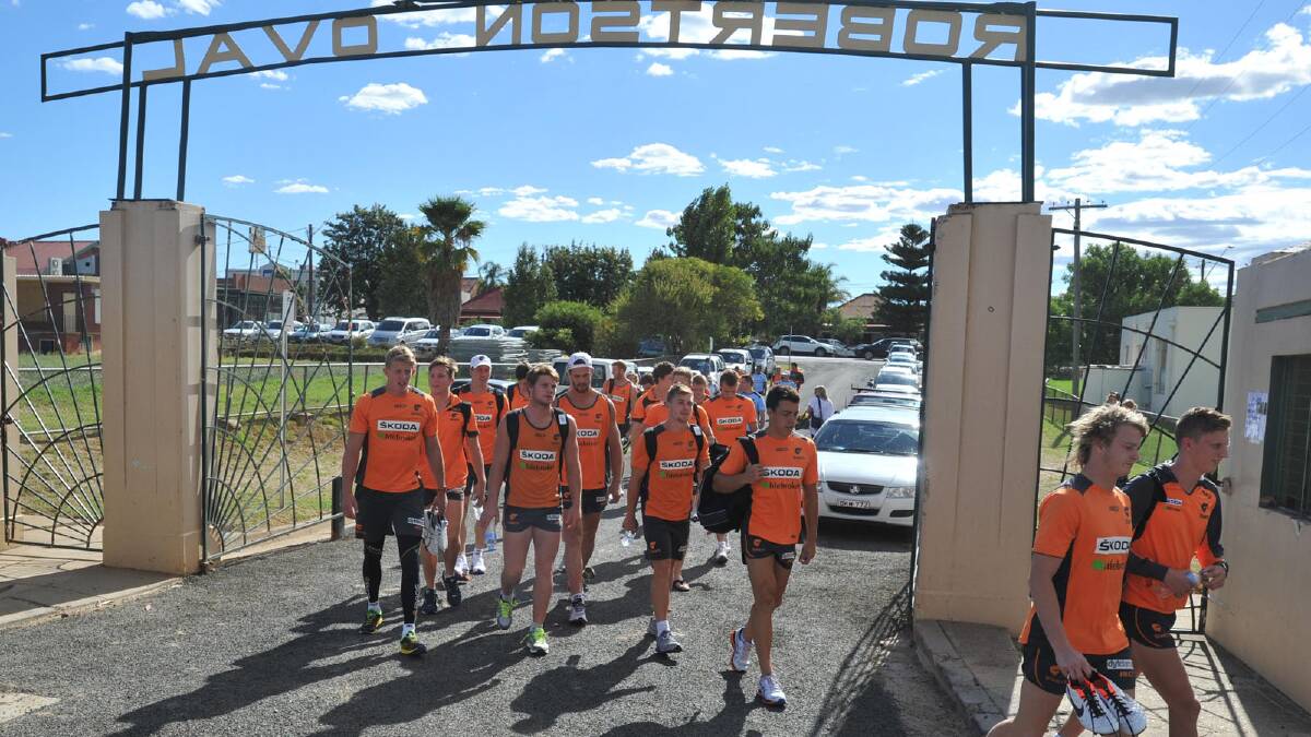 GIANT ARRIVAL: Greater Western Sydney players arrive at Robertson Oval yesterday afternoon for their opening training session. Picture: Les Smith