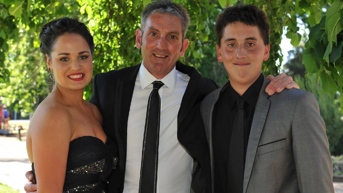 John Bittar (centre) with his twins Olivia and Joseph. Picture: Michael Frogley