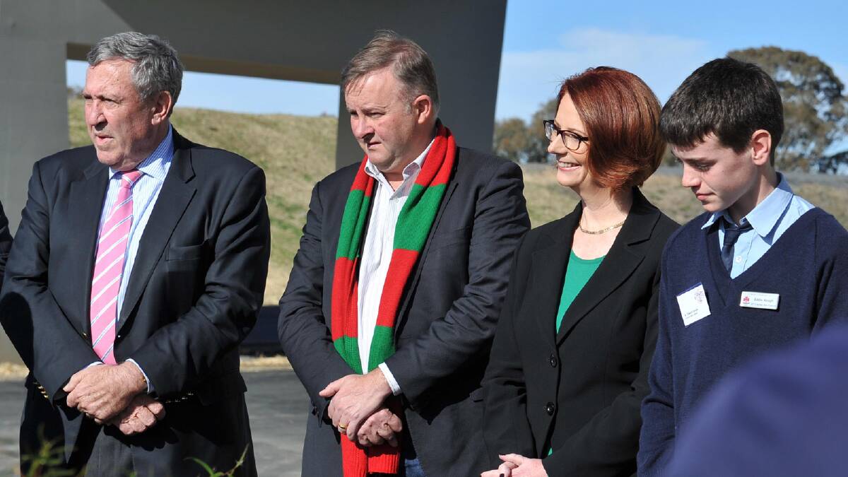 NSW Minister for Roads and Ports Duncan Gay, Minister for Infrastructure and Transport Anthony Albanese,  Prime Minister Julia Gillard with representative of St Patrick's School in Holbrook, Edward Keogh. Picture: Michael Frogley