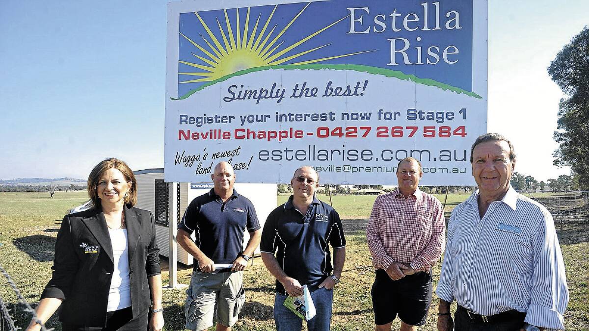 NEW BEGINNINGS: Catherine McCormack (Dennis Family Homes), Peter Hurst (Hurst Homes), Michael McFeeters (MJM Consulting Engineers), Matt Jenkins (Matt Jenkins Homes) and Neville Chapple (director Premium Property Brokers) gather at Wagga’s latest subdivision Estella Rise. Picture: Addison Hamilton