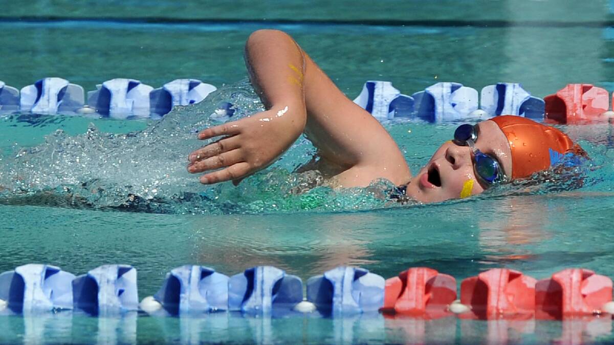 Meg Mundy, 8, on her way to winning 50m freestyle. Picture: Michael Frogley