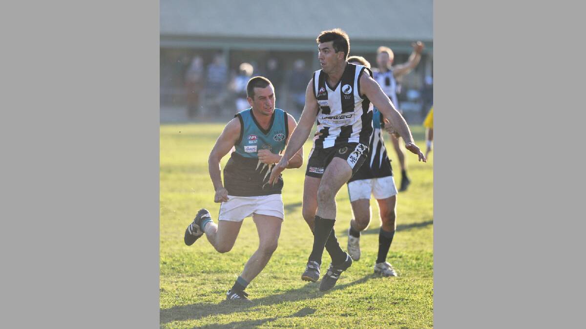 Farrer League. TRYC v Northern Jets. Northern Jets' Ben Prentice and TRYC's Michael Mazzocchi. Picture: Alastair Brook
