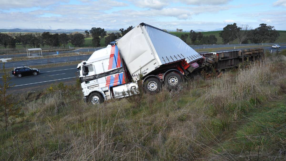 B-double truck rollover on Hume highway near Billabong Creek. Picture: Les Smith