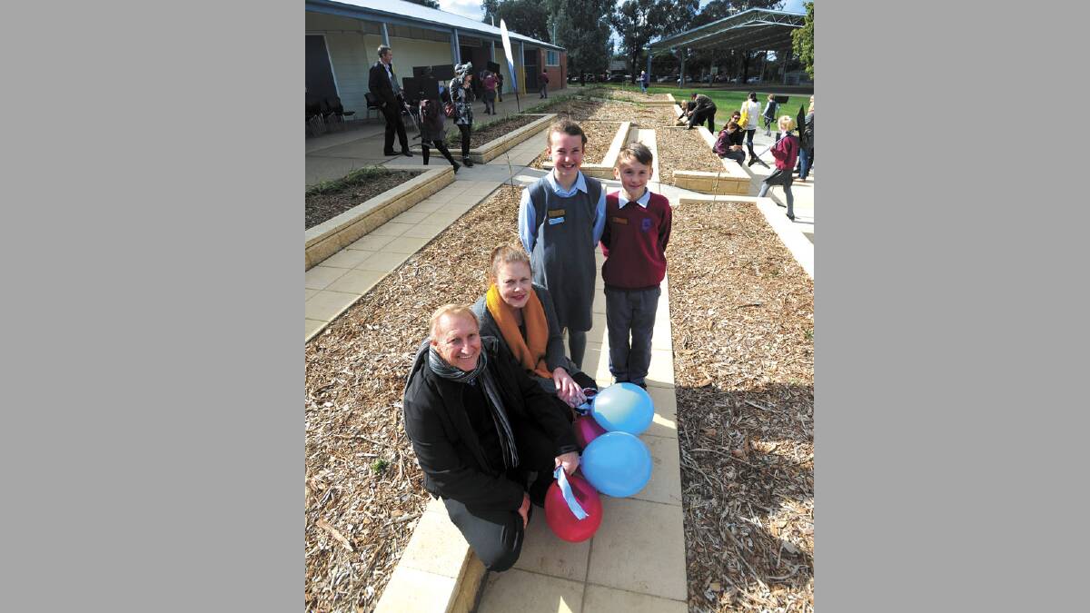 OPENING: Kooringal Public School captains (back, from left) Rachel Trenaman, 12, and Harry Moorby, 11,  stand with assistant principal Phil Gooley and PCYC president Jo Hughes at the official opening of the school’s amphitheatre.  Picture: Addison Hamilton
