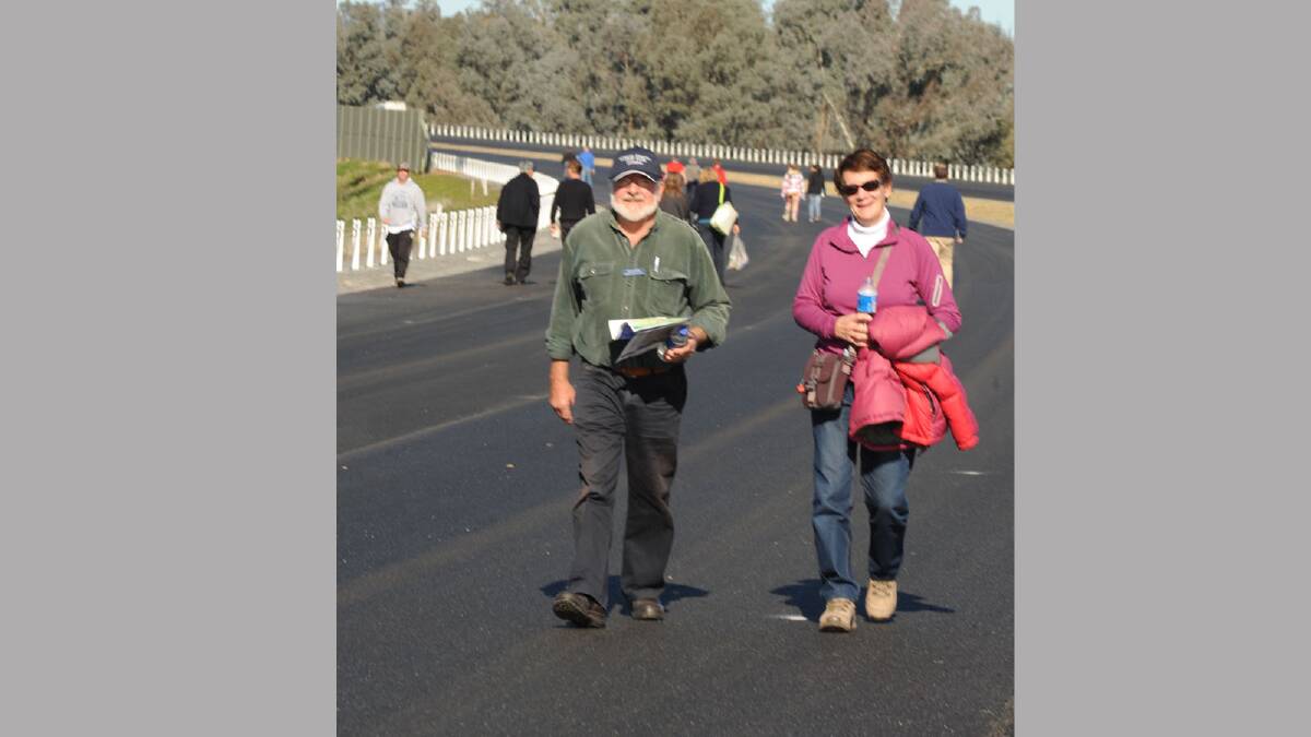 David and Pam Suters from Jindera, walking north along the new bypass. Picture: Keith Wheeler