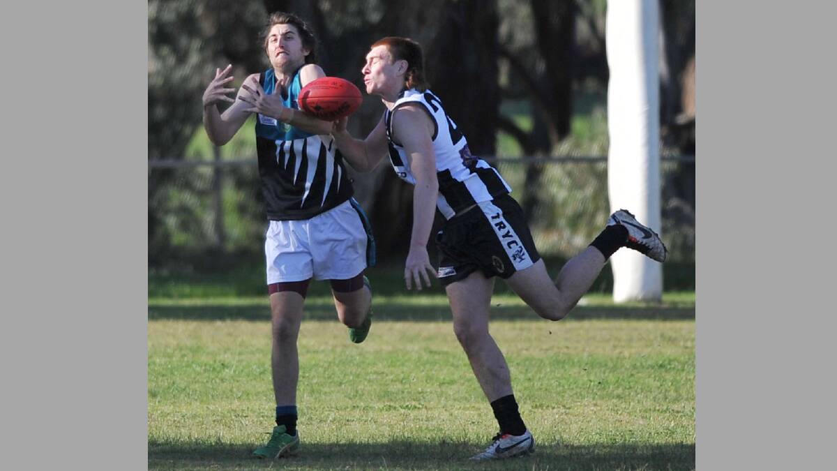 Farrer League. TRYC v Northern Jets. Northern Jets' Evan Lord and TRYC's Michael Coombes. Picture: Alastair Brook