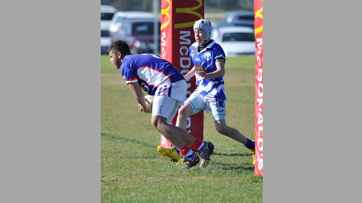 Junior rugby league. Turvey Park v Cootamundra. Turvey Park's Matt Lyons scores a try in front of Cootamundra's Blake Guthrie. Picture: Alastair Brook
