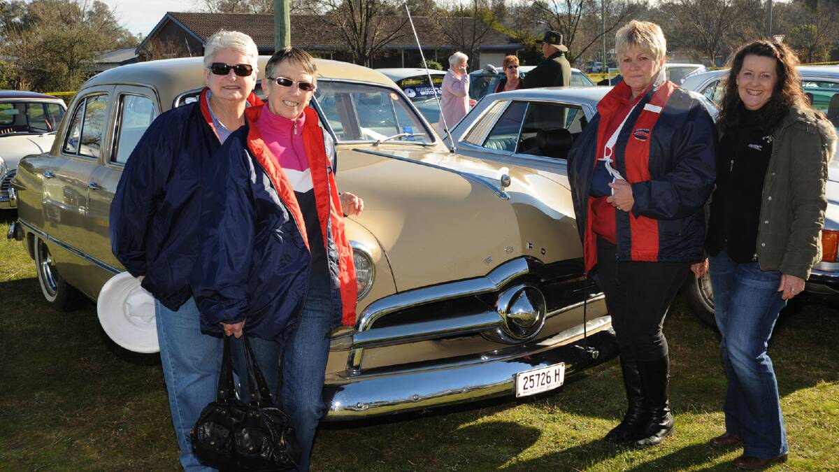 Wilma Cox from Culcairn, Nancy Nicholes from Marrar, Kristine Bormann and Liz Owen from Wagga, gathered around the Nicholes' 1949 Ford Custom.Picture: Keith Wheeler