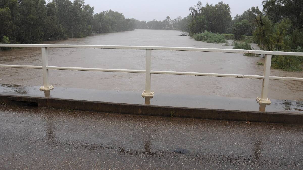Water rises around Eunony Bridge. Picture: Michael Frogley