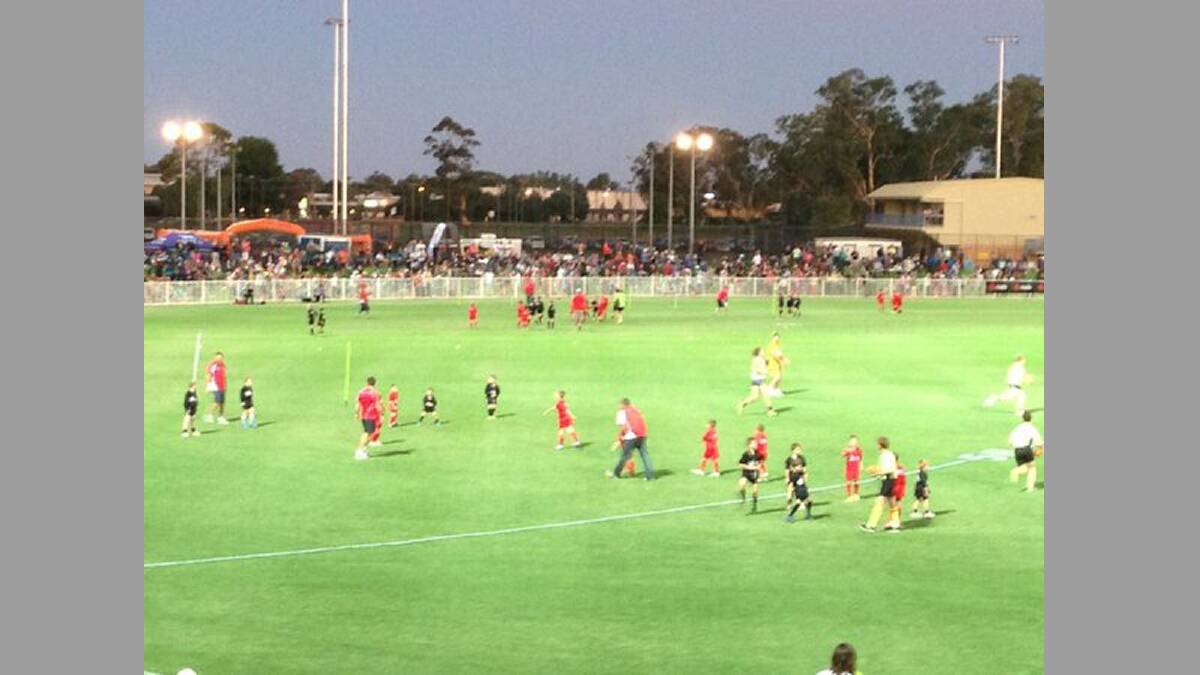Wagga Auskick participants get their first experience on Robertson Oval under lights during half time. 
