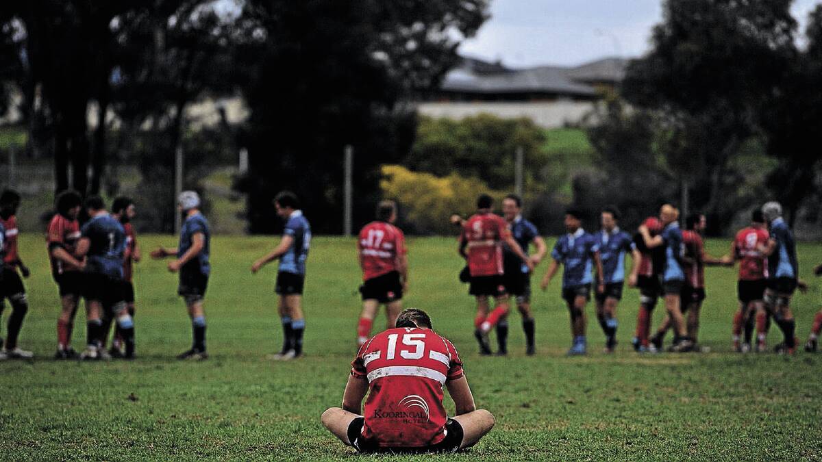 SHATTERED: CSU fullback Mitch Fealy contemplates the one-point loss to Waratahs after the final whistle in Saturday's preliminary final at Conolly Rugby Complex. Picture: Addison Hamilton
