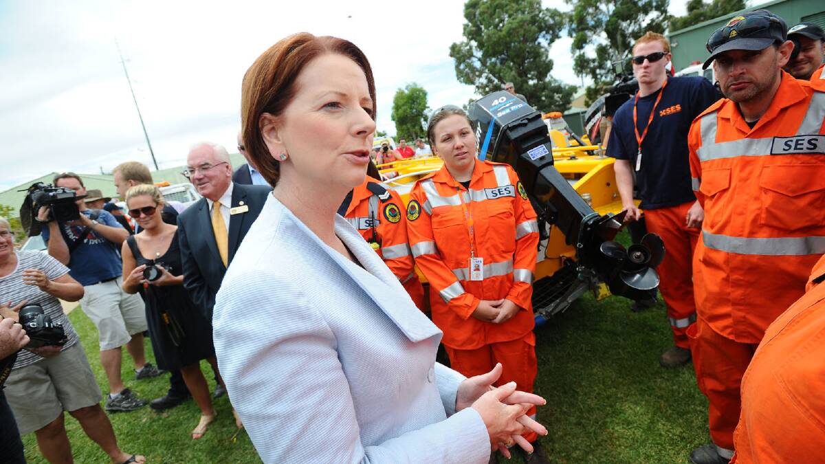 Prime Minister Julia Gillard meets with SES volunteers. Picture: Addison Hamilton