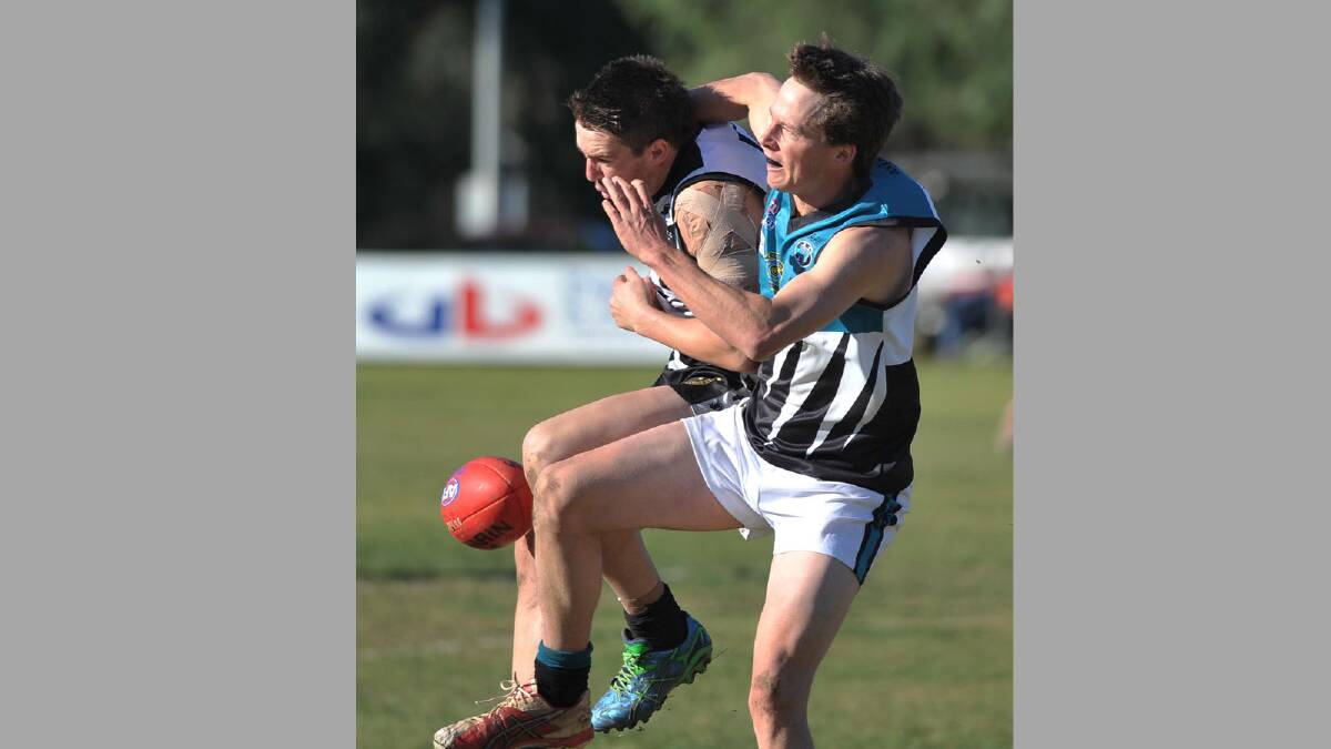 Farrer League. TRYC v Northern Jets. TRYC's Mitchell Ward and Northern Jets' Robert Edis. Picture: Alastair Brook