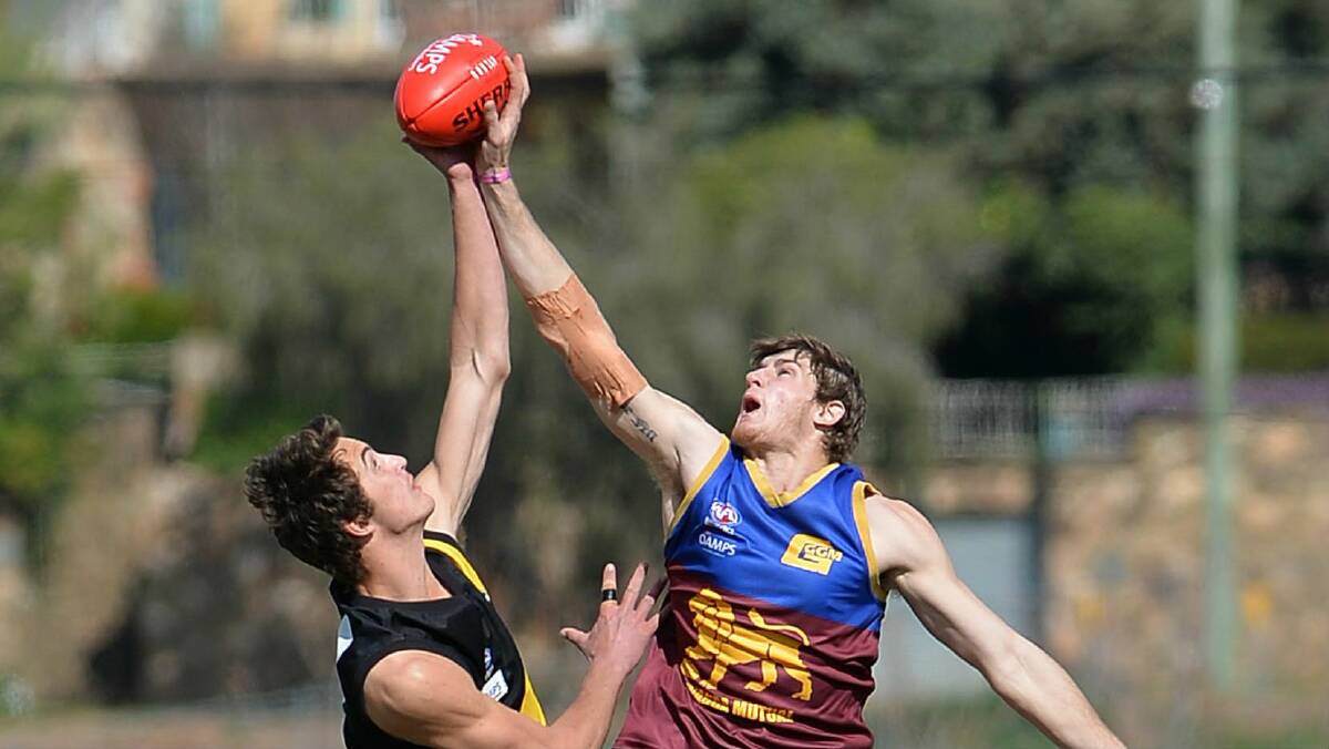 BIG BLOW: Ganmain-Grong Grong-Matong ruckman Jacob Olsson contests against Wagga Tigers' Brad Graham this year. Olsson has made the tough decision to leave the Lions. Picture: Michael Frogley