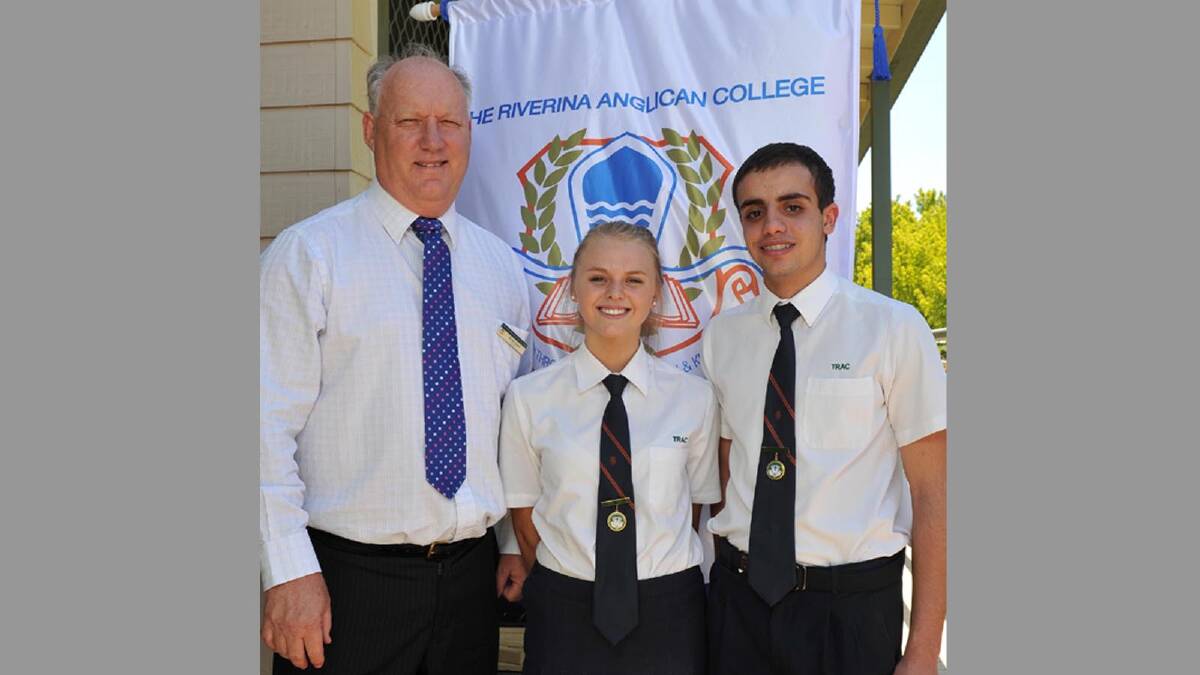 TRAC principal Dr Ian Grant with students Bronte Gooley and Youssef Abouelnasr, both 17, at the school yesterday. Picture: Michael Frogley