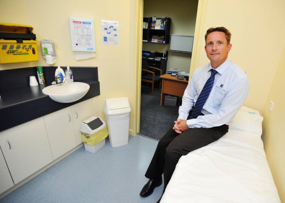 Riverina Cancer Care Centre managing director Damien Williams sits in a consulting room yesterday. Picture: Alastair Brook