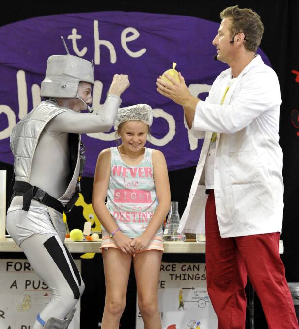 The Jollybops science show at the Wagga Marketplace last Wednesday, featuring Rusty the Robot and the Jolly Wizard. Caitlin Hoy, 12, of Wagga joins in the fun. Picture: Les Smith