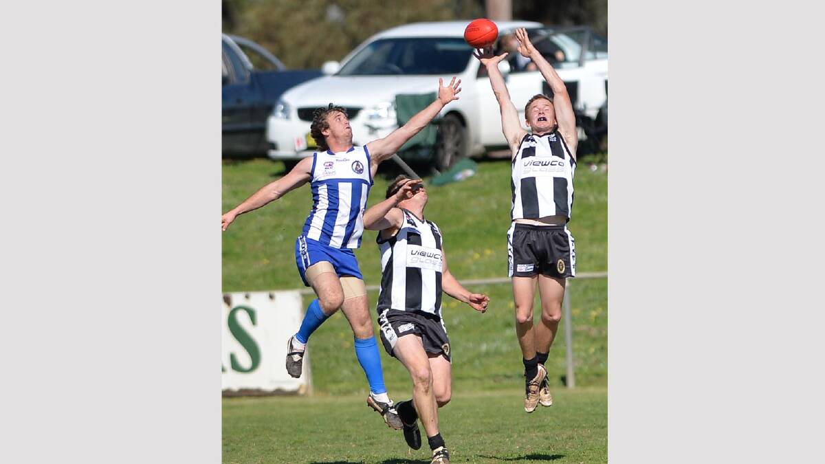 Farrer League at Maher Oval - Temora v TRYC. Liam Pattison (Temora) and Luke Webb and Ted Fellows of TRYC. Picture: Michael Frogley