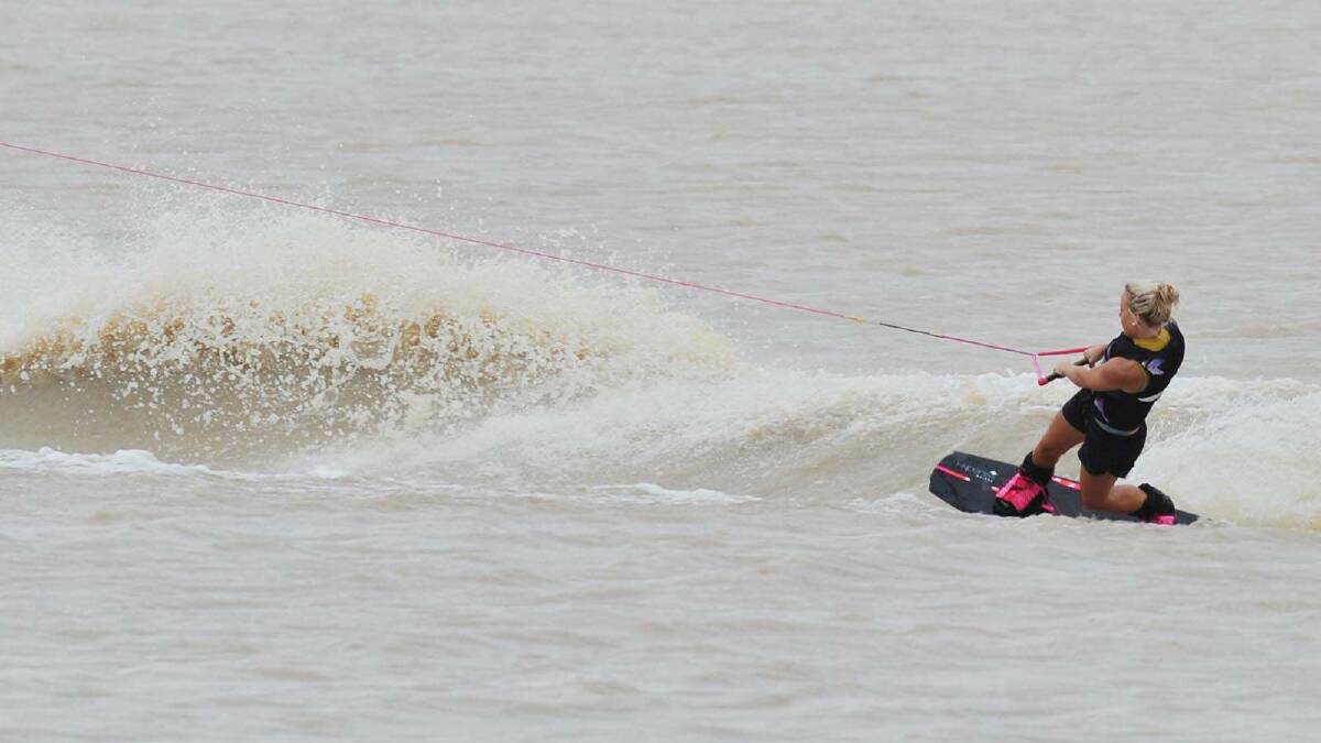 Caity Blaauw has a firm grip wakeboarding on Lake Albert. Picture: Alastair Brook