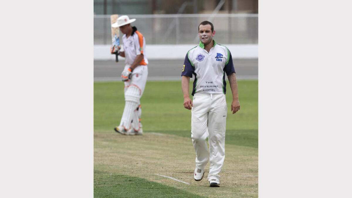 CRICKET: Wagga RSL v Wagga City at Wagga Cricket Ground. Wagga City bowler Jon Nicoll and batsman James Richards take a breather between balls. Picture: Les Smith
