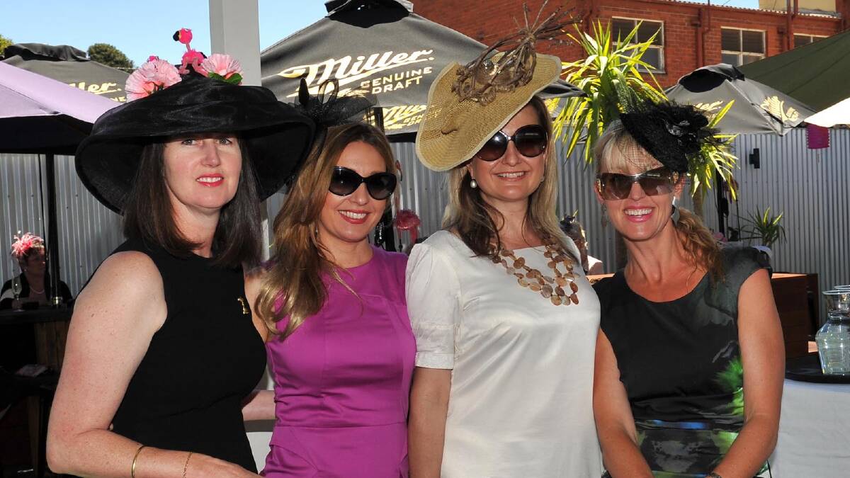 Kym Witney-Soanes, Simone Dowding, Genevieve Smith and Tracee Barnhill at the Mad Hatters' Melbourne Cup party at Birdhouse. Picture: Michael Frogley